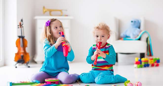 Boy-And-Girl-Playing-Flute-111165845.jpg